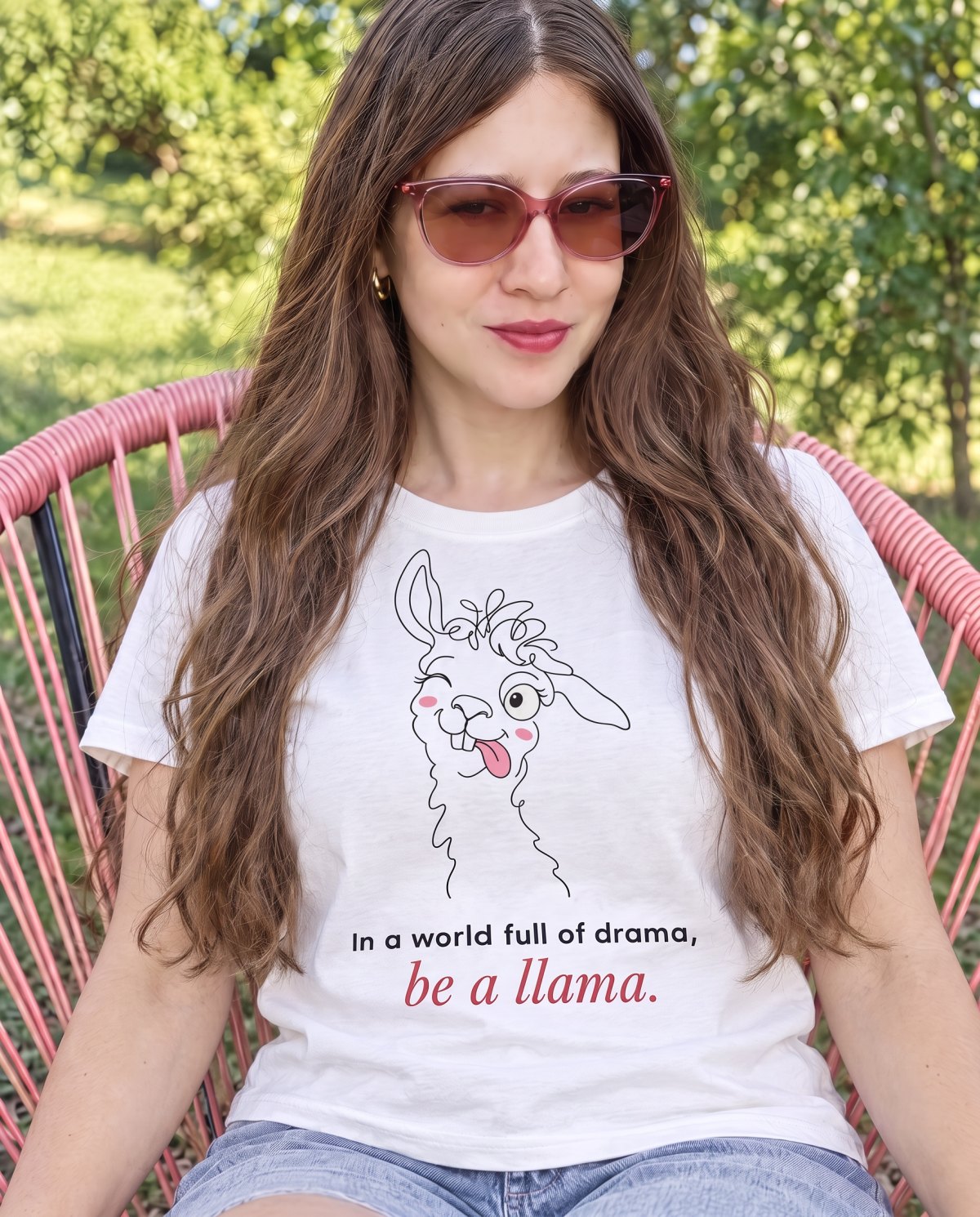 Funny Llama T Shirt: Organic Cotton Tee | Simply Ecologist 1 Ecologist Eli Frey wearing the white organic cotton funny llama t shirt with the slogan In a world full of drama, be a llama